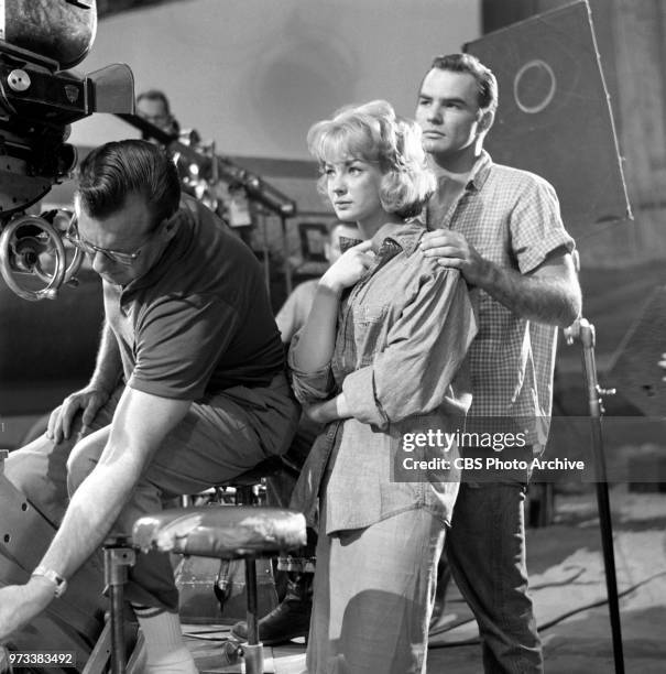 Television series, Alfred Hitchcock Presents. Episode, Escape to Sonoita. Pictured from left next to the cameraman is Venetia Stevenson , Burt...