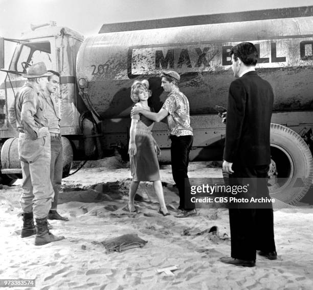 Television series, Alfred Hitchcock Presents. Episode, Escape to Sonoita. Pictured from left is James Bell , Burt Reynolds , Venetia Stevenson ,...