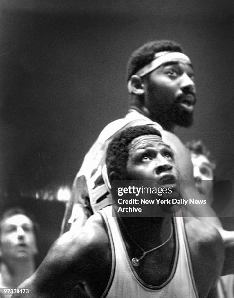 Willis Reed of the Knicks and Wilt Chamberlain of the Lakers as time runs out in game at Madison Square Garden.