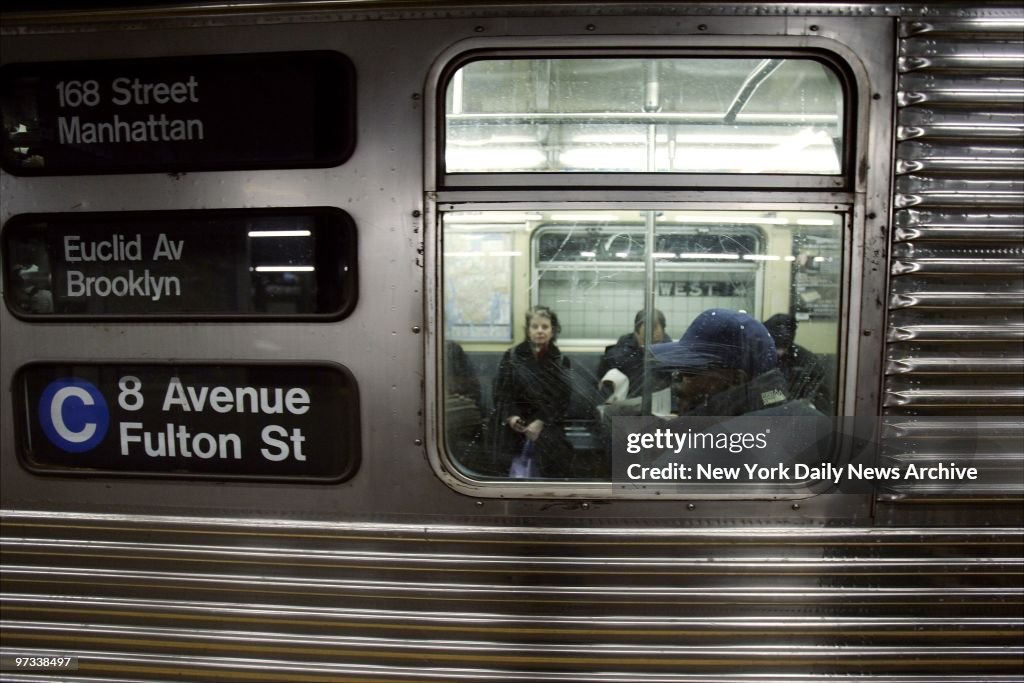 Passengers ride the C train, which is back in limited servic
