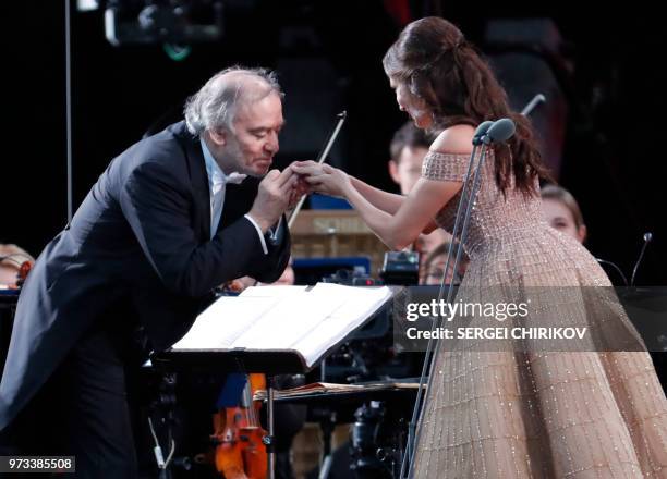 Russian conductor Valery Gergiev and Russian soprano Aida Garifullina perform during a gala-concert dedicated to the Russia 2018 World Cup football...