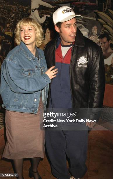 Drew Barrymore and actor Adam Sandler promoting their movie the "The Wedding Singer" at Planet Hollywood.