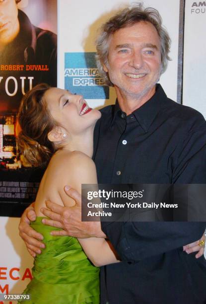 Drew Barrymore and Curtis Hanson arrive at the Borough of Manhattan Community College's Tribeca Performing Arts Center for the world premiere of the...