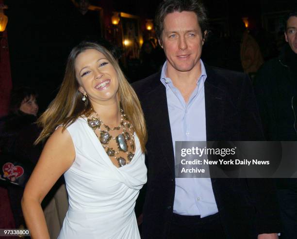 Drew Barrymore and Hugh Grant are at the Ziegfeld Theatre for the New York premiere of the movie "Music and Lyrics." They star in the film.