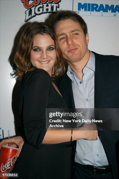 Drew Barrymore and Sam Rockwell arrive at the Paris Theater for the New York premiere of the movie "Confessions of a Dangerous Mind." They star in...