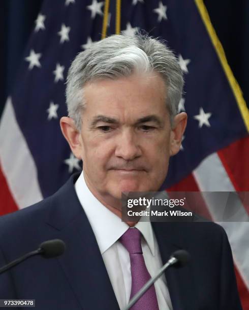 Federal Reserve Chairman Jerome Powell walks into a news conference June 13, 2018 in Washington, DC. After a two-day meeting the Chairman Powell...