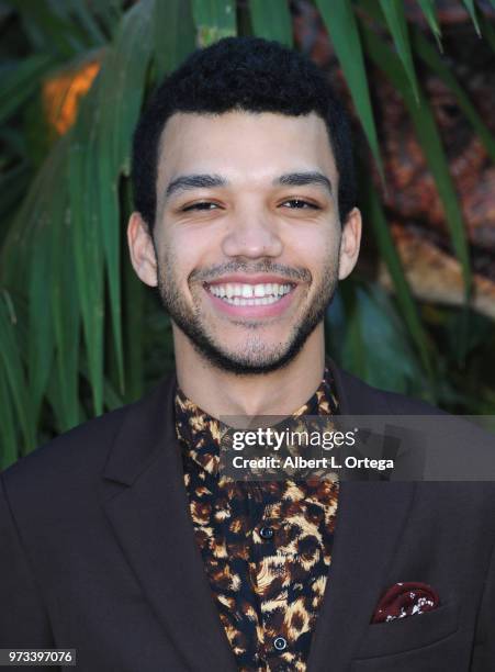Actor Justice Smith arrives for the Premiere Of Universal Pictures And Amblin Entertainment's "Jurassic World: Fallen Kingdom" held at Walt Disney...
