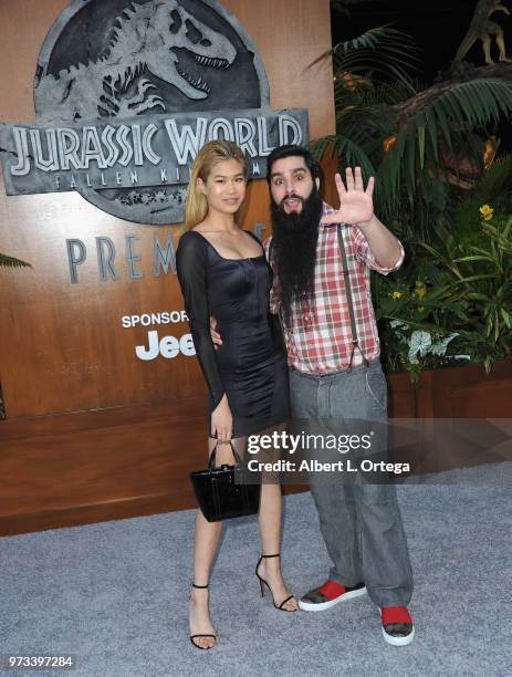 Director Jordan Vogt-Roberts and model Justine Biticon arrive for the Premiere Of Universal Pictures And Amblin Entertainment's "Jurassic World:...