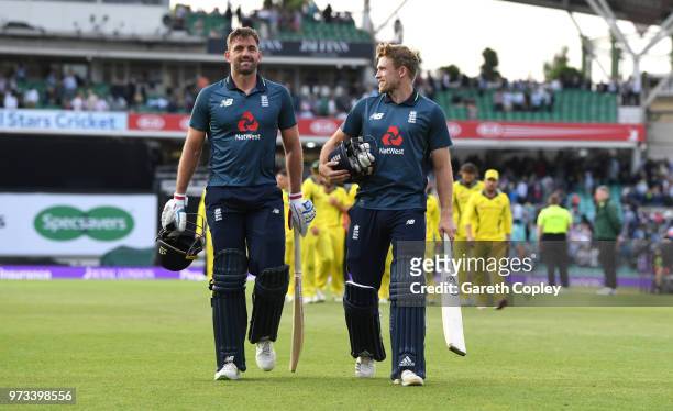 David Willey and Liam Plunkett of England celebrate winning the 1st Royal London ODI match between England and Australia at The Kia Oval on June 13,...