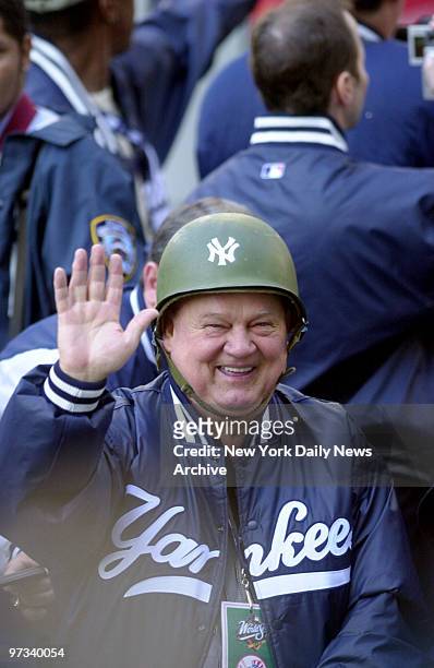 Yankee coach Don Zimmer with NY logo army helmet during New York Yankees' 1999 World Series Victory Parade.