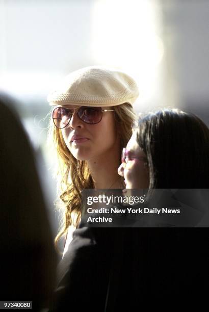 Yankee infielder Derek Jeter's new girlfriend, singer Joy Enriquez watches from a front-row seat behind home plate at Yankee Stadium as the New York...