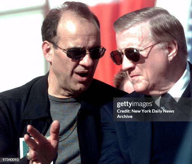 Yankee manager Joe Torre and owner George Steinbrenner chat on the steps of City Hall after the New York Yankees' 1999 World Series Victory Parade.