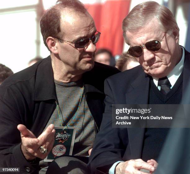 Yankee manager Joe Torre and owner George Steinbrenner chat on the steps of City Hall after the New York Yankees' 1999 World Series Victory Parade.