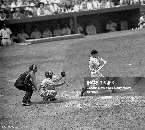 Yanks vs. Philadelphia: Joe DiMaggio hits a pitch. Yanks vs. Philadelphia: Joe DiMaggio hits a pitch.