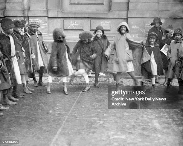 Young girls dancing the Charleston in Harlem in 1920's.