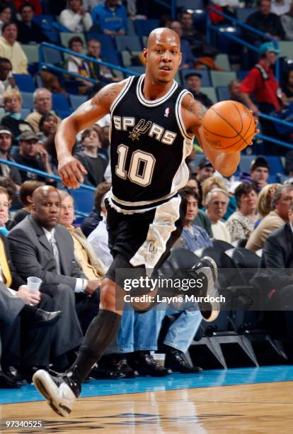 Keith Bogans of the San Antonio Spurs drives against the New Orleans Hornets on March 1, 2010 at the New Orleans Arena in New Orleans, Louisiana....