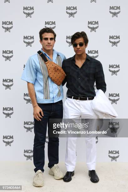 Carlo Sestini and Michele Merlo attend the MCM Fashion Show Spring/Summer 2019 during the 94th Pitti Immagine Uomo on June 13, 2018 in Florence,...
