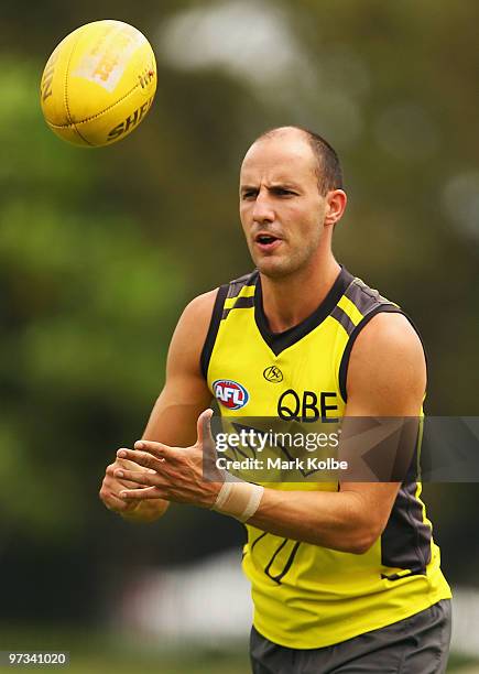 Tadhg Kennelly hand balls during a Sydney Swans AFL training session at Lakeside Oval on March 2, 2010 in Sydney, Australia.
