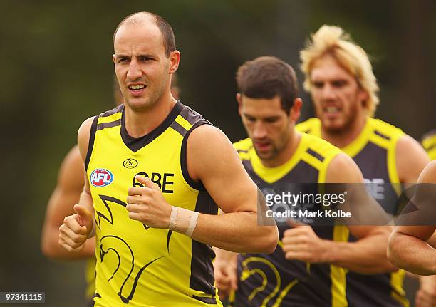 Tadhg Kennelly runs with his team mates during a Sydney Swans AFL training session at Lakeside Oval on March 2, 2010 in Sydney, Australia.