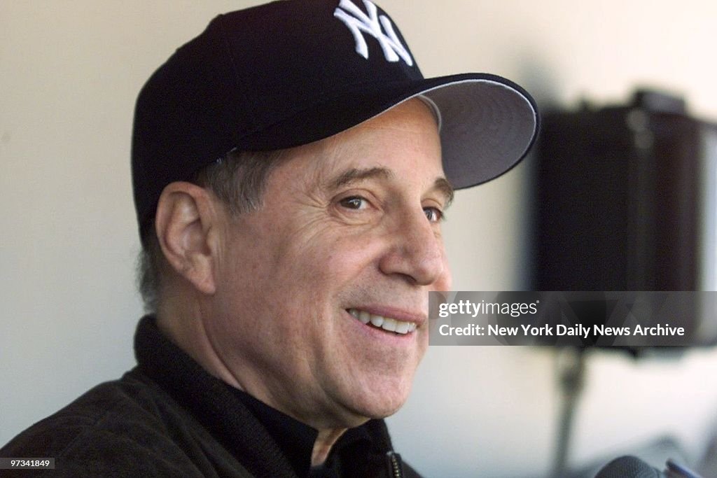 Paul Simon in the New York Yankees' dugout before a memorial