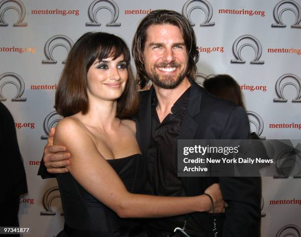Penelope Cruz and Tom Cruise cozy up during Mentoring's Big Night on the Hudson at Pier 60 on the Chelsea Piers. Cruise was presented with the...