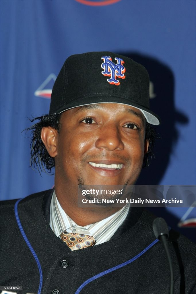 Pedro Martinez is all smiles in his new New York Mets' cap a