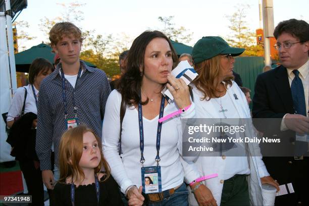 Patty Smyth holds daughter Anna's hand as she and Penny Marshall arrive at the National Tennis Center at Flushing Meadows-Corona Park, Queens, where...