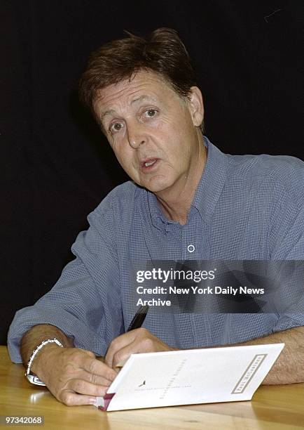 Paul McCartney signs copies of his book of poetry and lyrics, "Blackbird Signing," at Barnes & Noble on Fifth Ave.