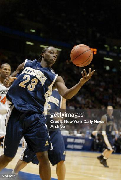 Pittsburgh Panthers' Chris Taft tries to get a grip on the ball during NCAA Regional Playoff game against the Oklahoma State Cowboys at Continental...