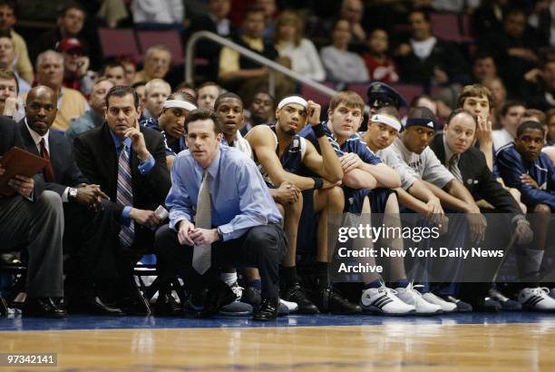 Pittsburgh Panthers' coach Jamie Dixon watches from the sidelines as his team takes on the Oklahoma State Cowboys in an NCAA Regional Playoff game at...