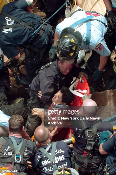 Police and firefighters work to free two construction workers after a wall collapsed at a construction site on 11th St. In Gowanus. Manuel Vergara...