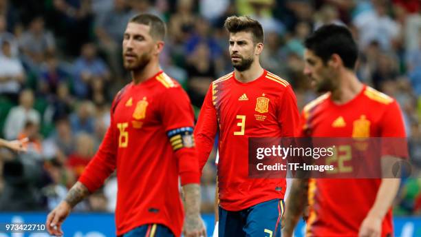 Gerard Pique of Spain, Sergio Ramos of Spain and Isco Alarcon of Spain look on during the friendly match between Spain and Tunisia at Krasnodar's...