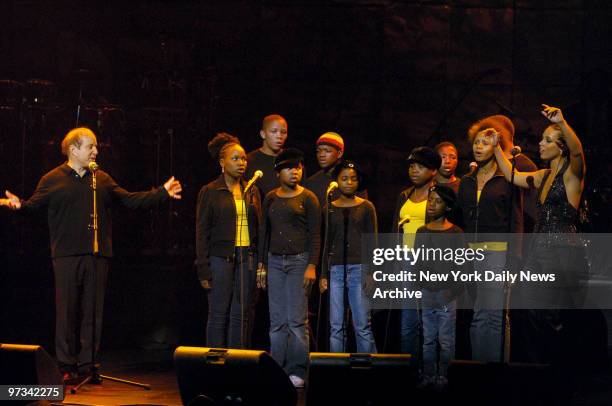 Paul Simon and Alicia Keys perform with children during "The Black Ball," an annual fundraiser benefiting Keep A Child Alive , at Jazz at Lincoln...