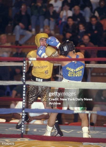 Paulie Malignaggi on the way to victory versus Antonio Oliveros during Golden Gloves boxing match at Christ the King High School.