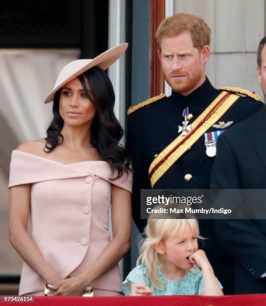 Meghan, Duchess of Sussex, Prince Harry, Duke of Sussex and Isla Phillips stand on the balcony of Buckingham Palace during Trooping The Colour 2018...