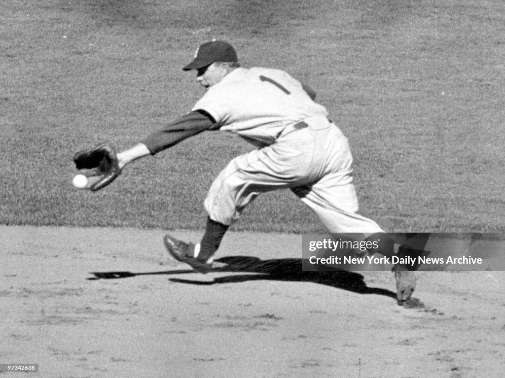 Pee Wee Reese of the Brooklyn Dodgers takes a six-inning hit