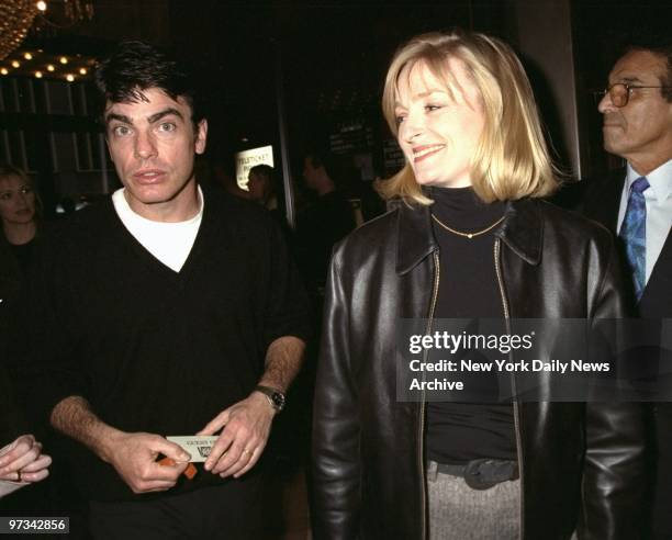 Peter Gallagher and wife, Paula, arrive at the Ziegfeld Theater for screening of the movie "Bulworth."