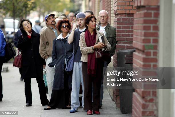 People line up for flu shots outside a clinic in the Covenant House on W. 17th St. The city gave flu shots to thousands of New Yorkers to prepare for...