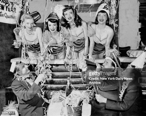 People starting the New Year's Eve celebration early at the Latin Quarter. Women left to right: Billy Jean, Beverly Richard, Priscilla Callan, and...