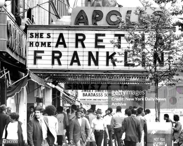 People waiting on line to buy tickets to see Aretha Franklin at Apollo Theatre, 252 West 125th Street, Harlem