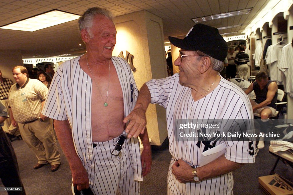 Perfect-game pitcher Don Larsen (left) and Yogi Berra share