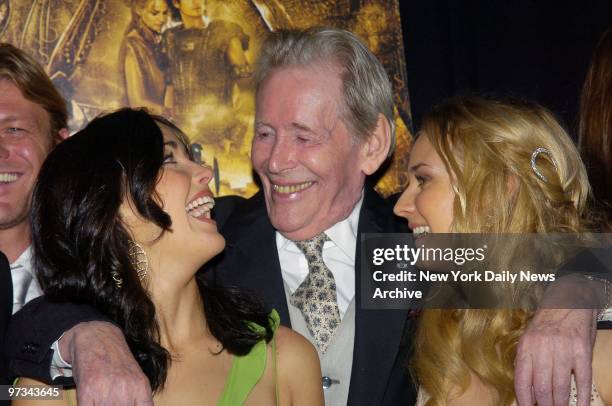 Peter O'Toole is flanked by beauties Rose Byrne and Diane Kruger at the Ziegfeld Theater for the U.S. Premiere of the movie "Troy." They star in the...