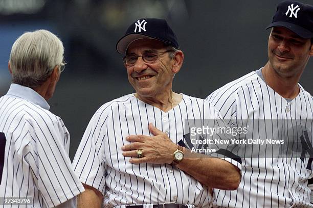 Phil Rizzutto, Yogi Berra and Don Mattingly during introductions for the annual Old-Timers' Day festivities at Yankee Stadium.
