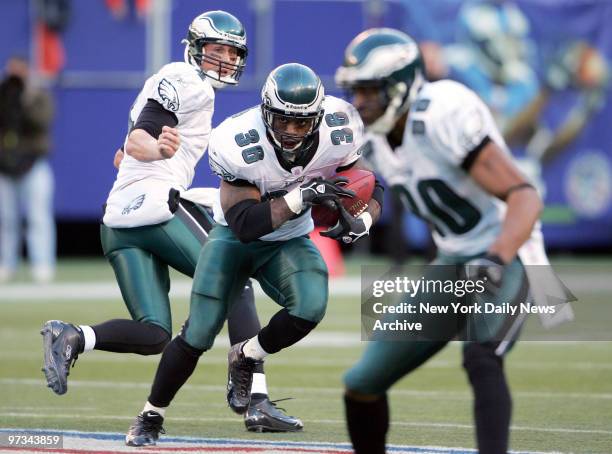 Philadelphia Eagles' running back Brian Westbrook carries the ball in the second half against the New York Giants at Giants Stadium. The Giants won,...