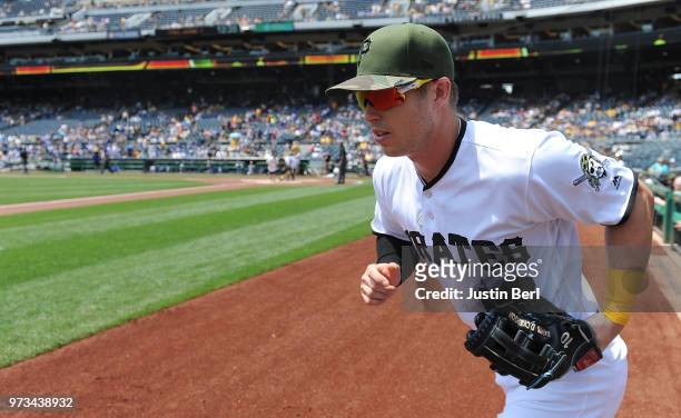 Corey Dickerson of the Pittsburgh Pirates takes the field in the first inning during the game against the Los Angeles Dodgers at PNC Park on June 7,...
