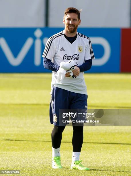 Lionel Messi of Argentina smiles during an open to public training session at Bronnitsy Training Camp on June 11, 2018 in Bronnitsy, Russia.