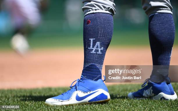 Detail view of Nike baseball shoes worn by George Lombard of the Los Angeles Dodgers during the game against the Pittsburgh Pirates at PNC Park on...