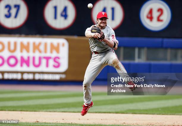 Philadelphia Phillies' third baseman David Bell throws to first to get New York Mets' Paul Lo Duca out on his grounder in the ninth inning of game at...