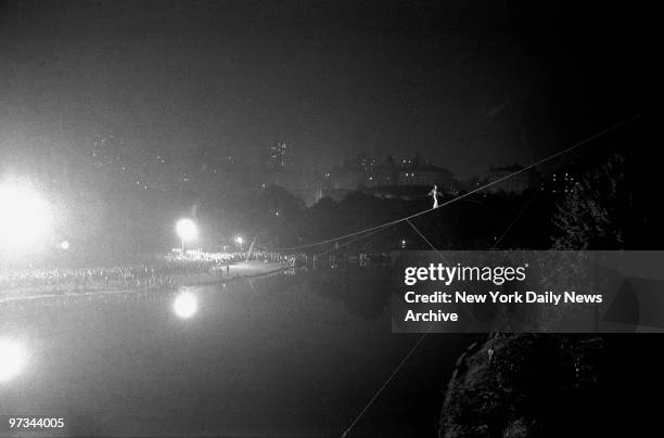 Philippe Petit goes on what amounts to one of the safest walks ever taken at night in Central Park as he negotiates a 600-foot-long cable strung over...