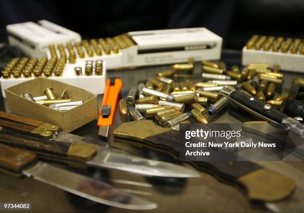 Photo taken of ammunition and knives found in the night table of Raymond Sheehan. Barbara Sheehan, fatally shot Raymond because of the abusive...